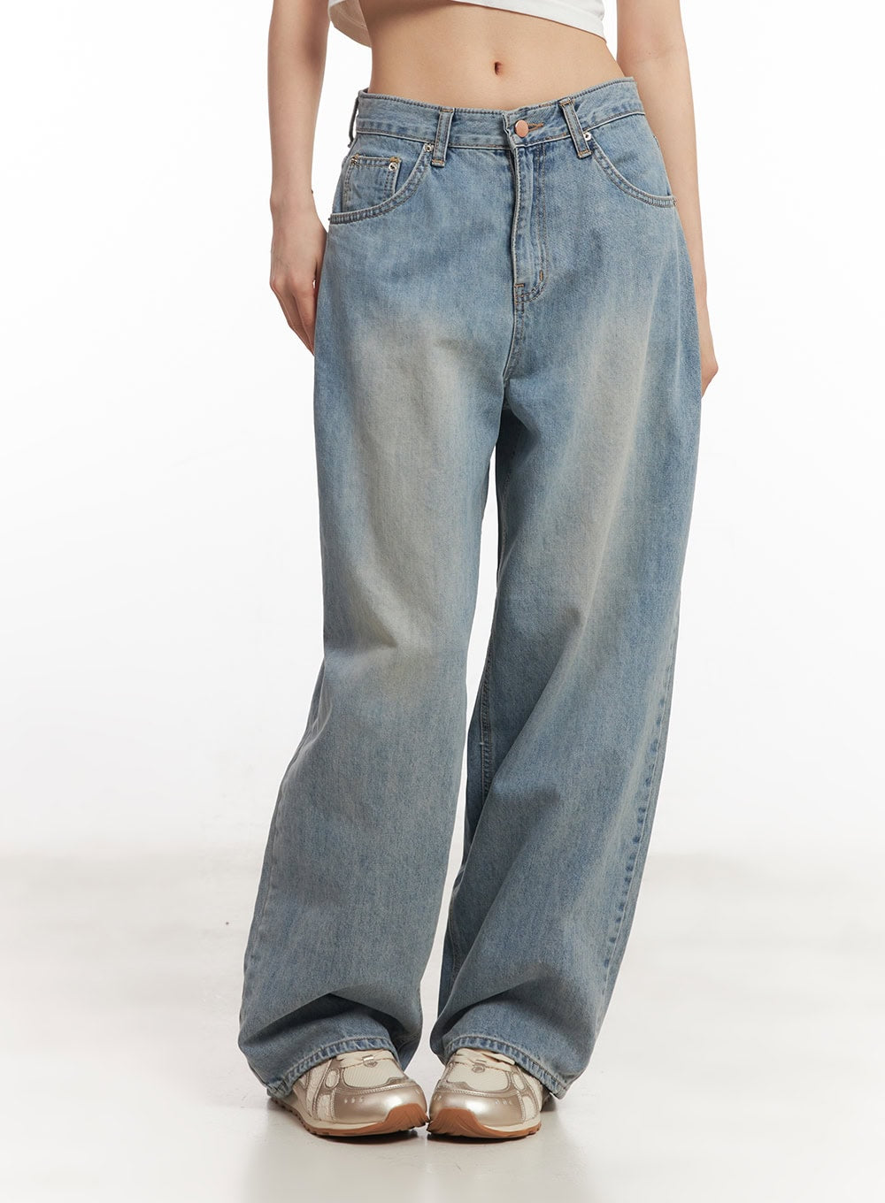 Devyn Wide-Leg Jeans CA503 in blue, front waist-to-hem crop shot on model, washed cotton denim, low-rise five-pocket design, voluminous wide-leg silhouette, white crop top.