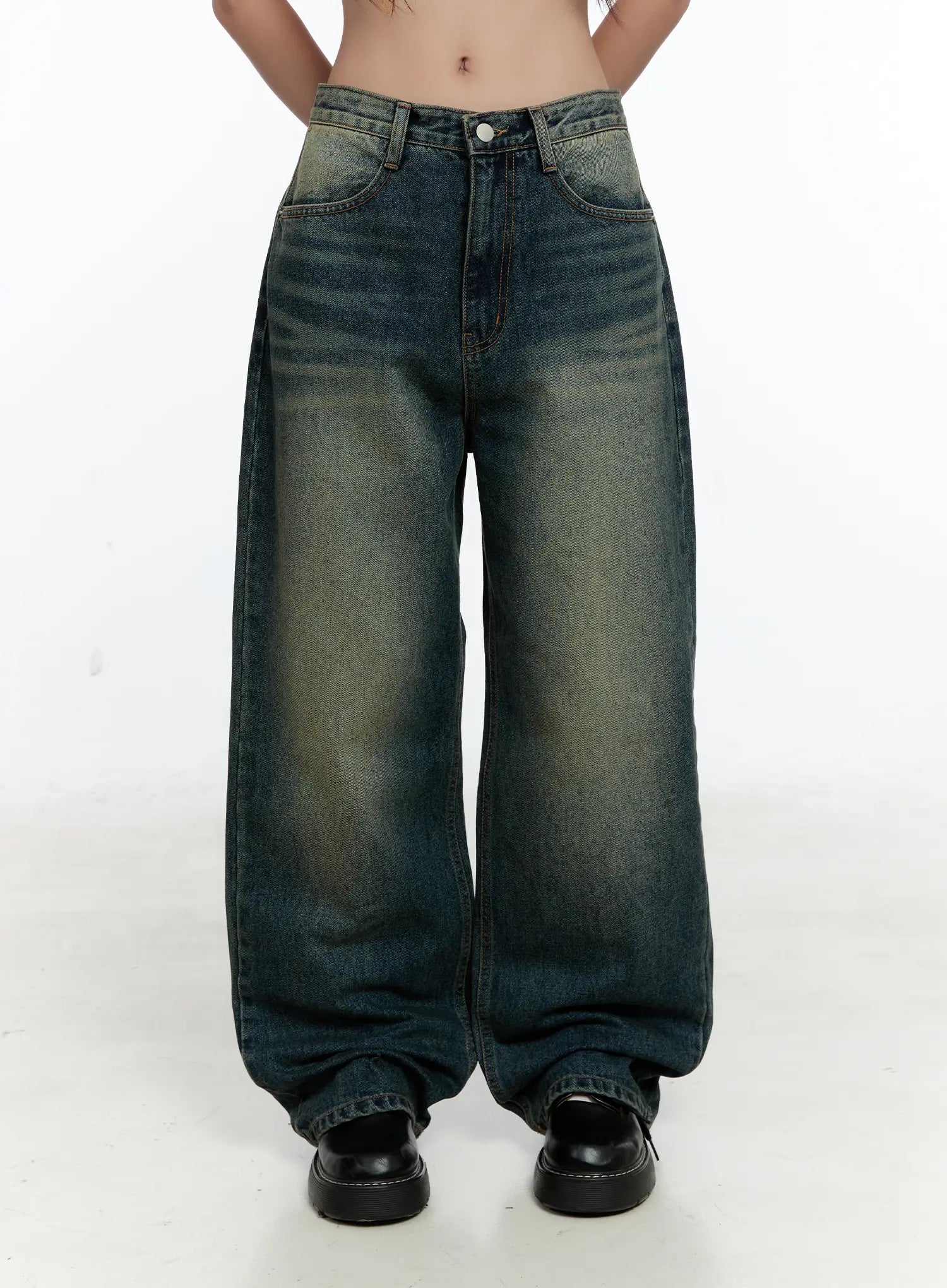 Lilian Vintage Wash Wide-Leg Jeans CS518 in vintage blue-green, front full-length product shot on model, hands behind back, wide-leg silhouette with yellow-green wash fade, black loafers.