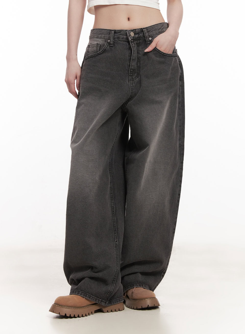 Dianna Baggy Jeans CM518 in dark gray, angled front close-up from waist to hem on model, low-rise fit, washed cotton denim with bold balloon-wide leg silhouette.