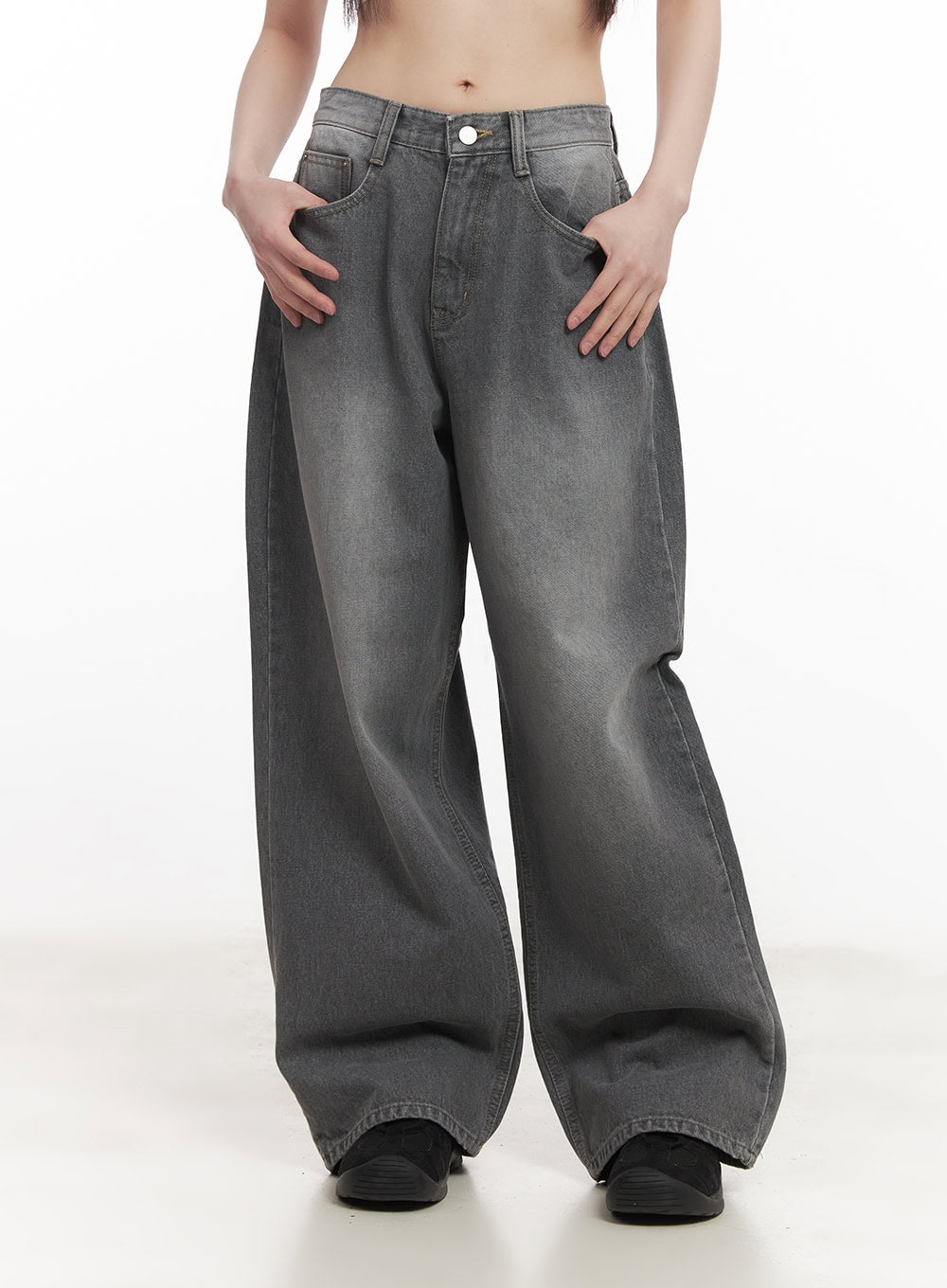 Venessa Washed Baggy Jeans CM528 in dark gray, front waist close-up on model, faded wash gradient, five-pocket construction, and wide-leg opening detail visible.