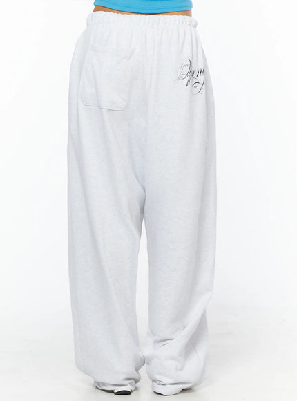graphic-lettering-studded-wide-leg-sweatpants-cu518
