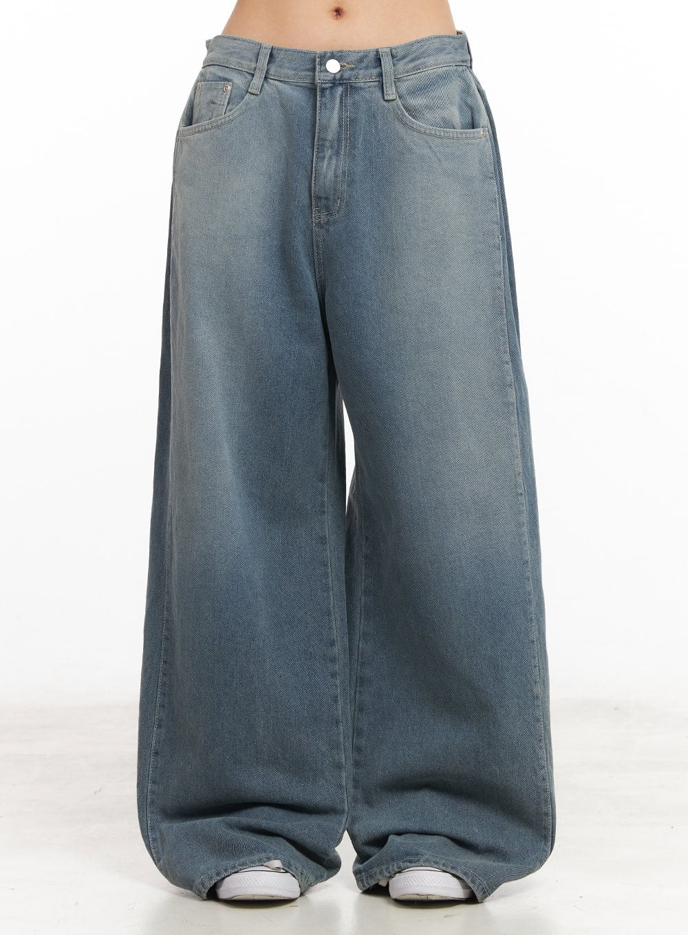 Amber Pintuck Wide-Leg Jeans CM511 in blue, front waist-to-hem product-focused shot on model, washed cotton denim, pintuck detail, extra-wide leg with floor-pooling hem.