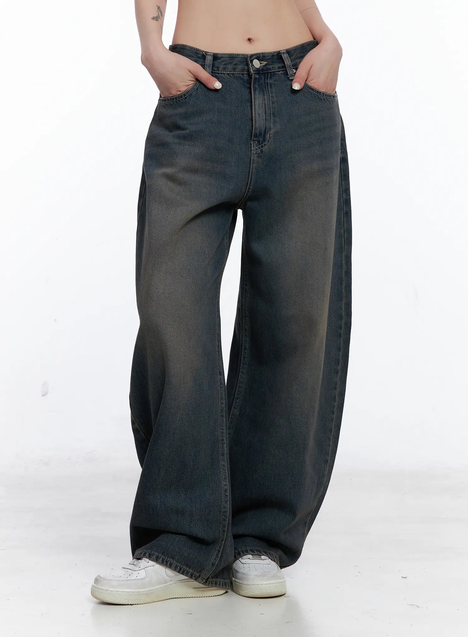 Ocean Faded Balloon Fit Jeans CS510 in washed dark indigo, front product-focused shot from waist to hem on model, hands in pockets, balloon wide-leg cotton denim with faded wash.