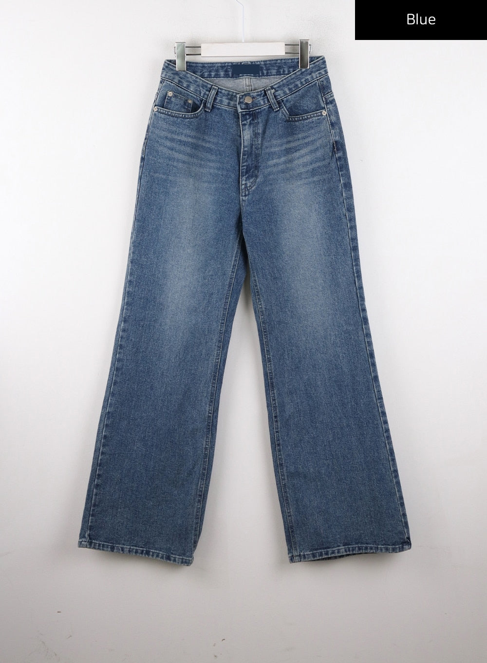 Wide Leg Jeans J12 in blue, flat hanger front product shot, wide-leg cotton denim with gradation wash, front pockets, button fly, and asymmetric waistband detail shown.