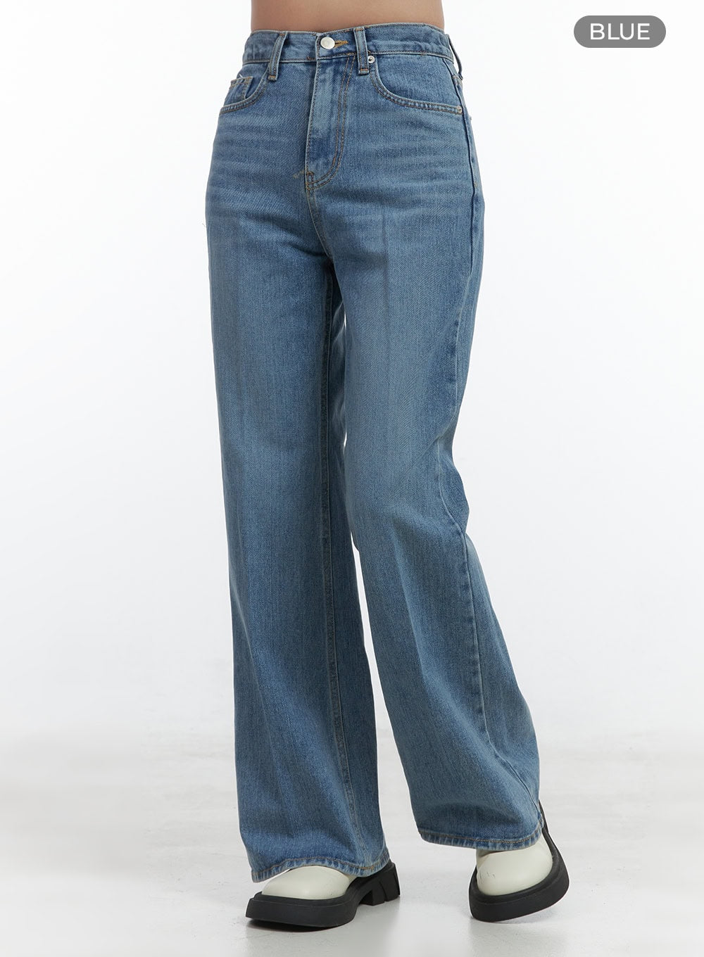 Aubrey Washed Classic Straight-Fit Jeans OO421 in blue, angled front view on model, high-rise waistband with button fly, five-pocket washed cotton denim, wide straight leg, white platform sneakers.