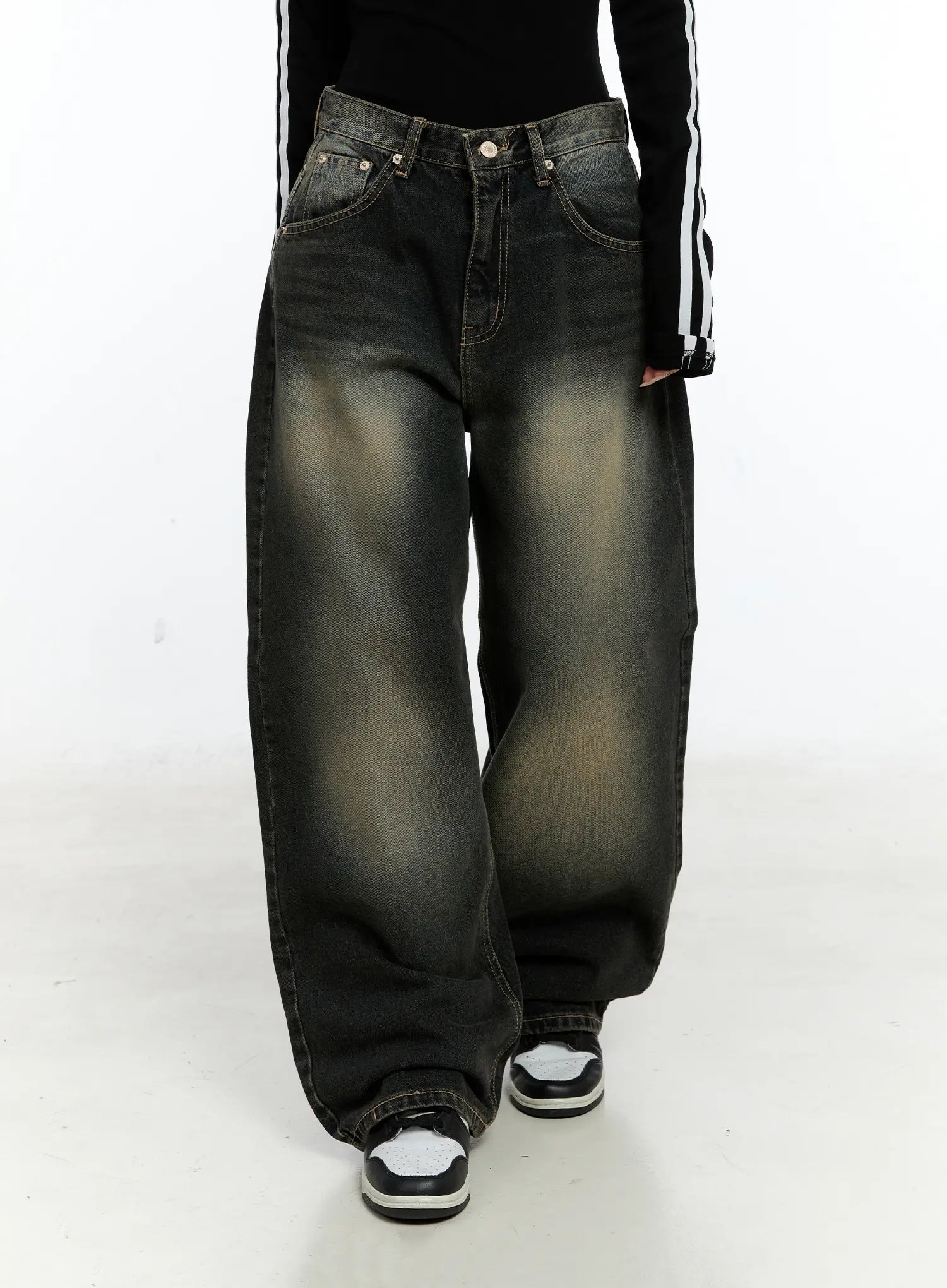 Emerie Washed Wide-Leg Baggy Jeans CS518 in dark blue, front mid-shot on model in motion, showcasing wide-leg sweep and washed gradient from dark waist to golden thigh on cotton denim.