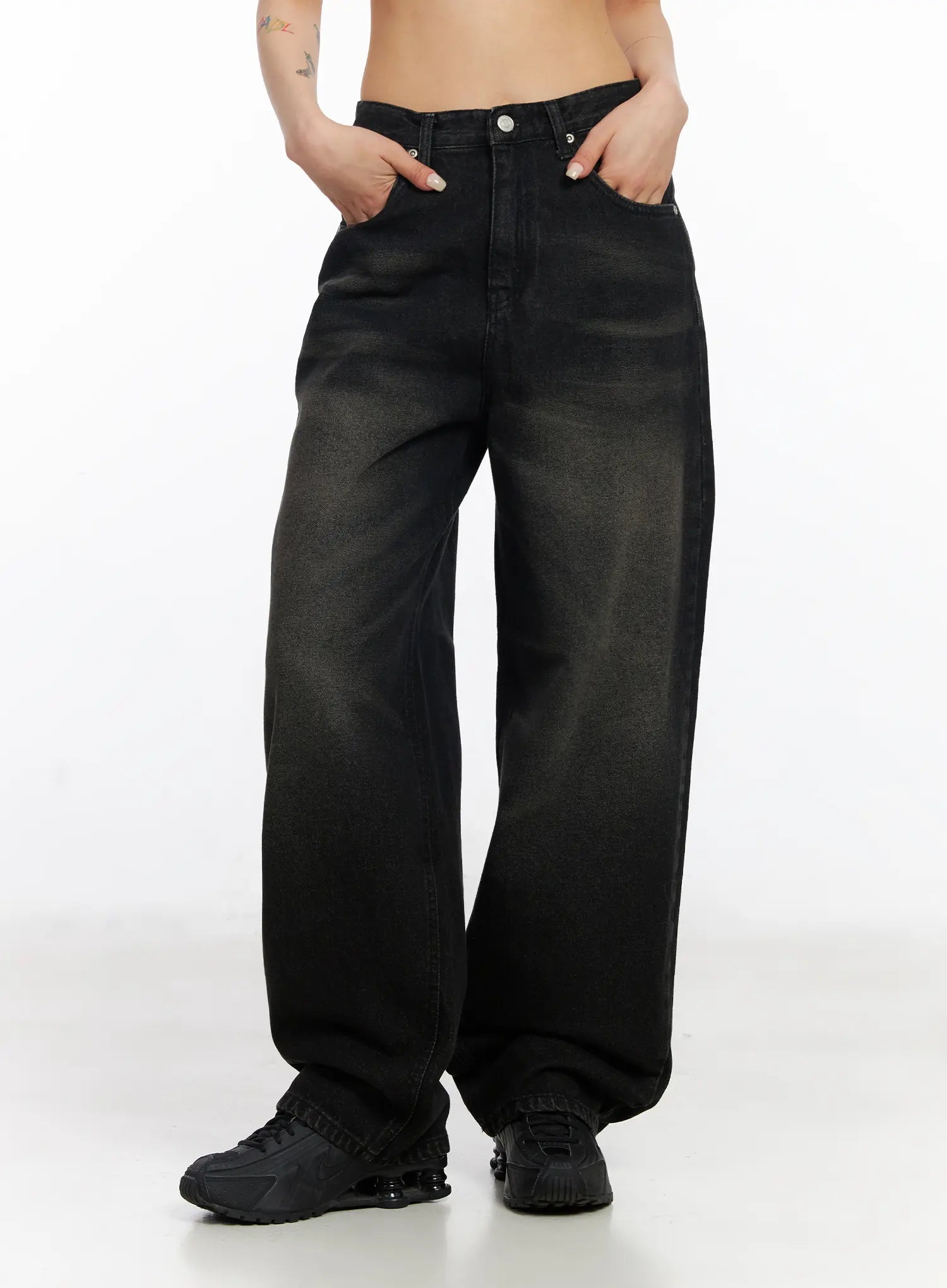 Dayana Vintage Washed Wide-Leg Jeans CJ523 in black, front three-quarter crop shot, model hands in pockets, vintage faded wash and wide-fit cotton denim with slight leg volume.