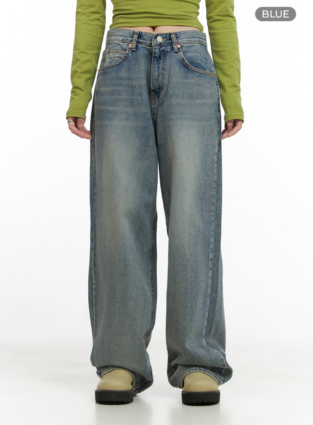 Millie Washed Baggy Jeans CG421 in Blue, front waist-down product shot, wide-fit washed denim with button fly, five-pocket design, and vintage faded wash, paired with green crop top.