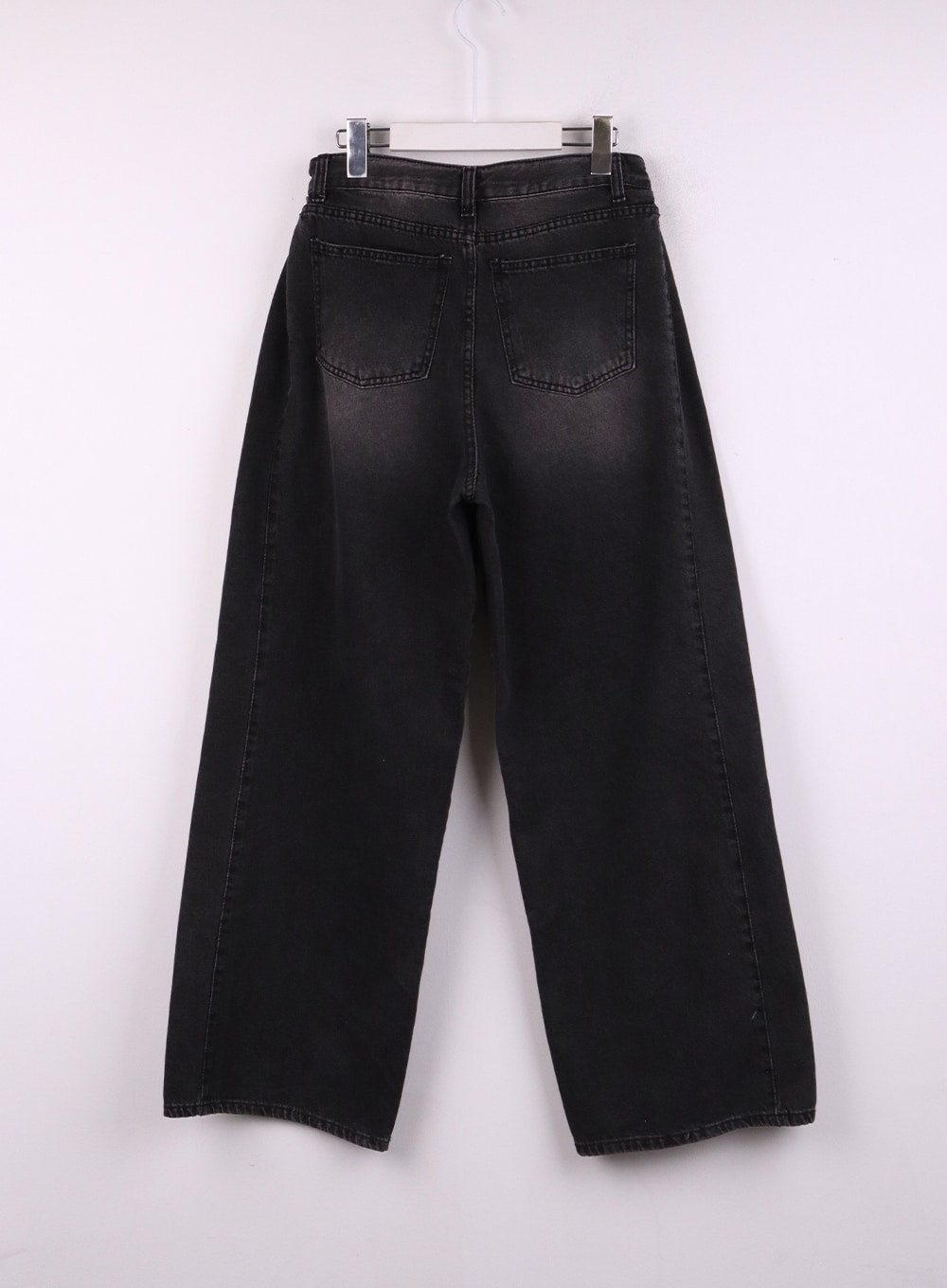 Washed Denim Wide-Leg Jeans CJ426 in black, flat hanger back shot, washed cotton denim showing dual back pockets with stitching, wide-leg petite silhouette, faded waistband detail.