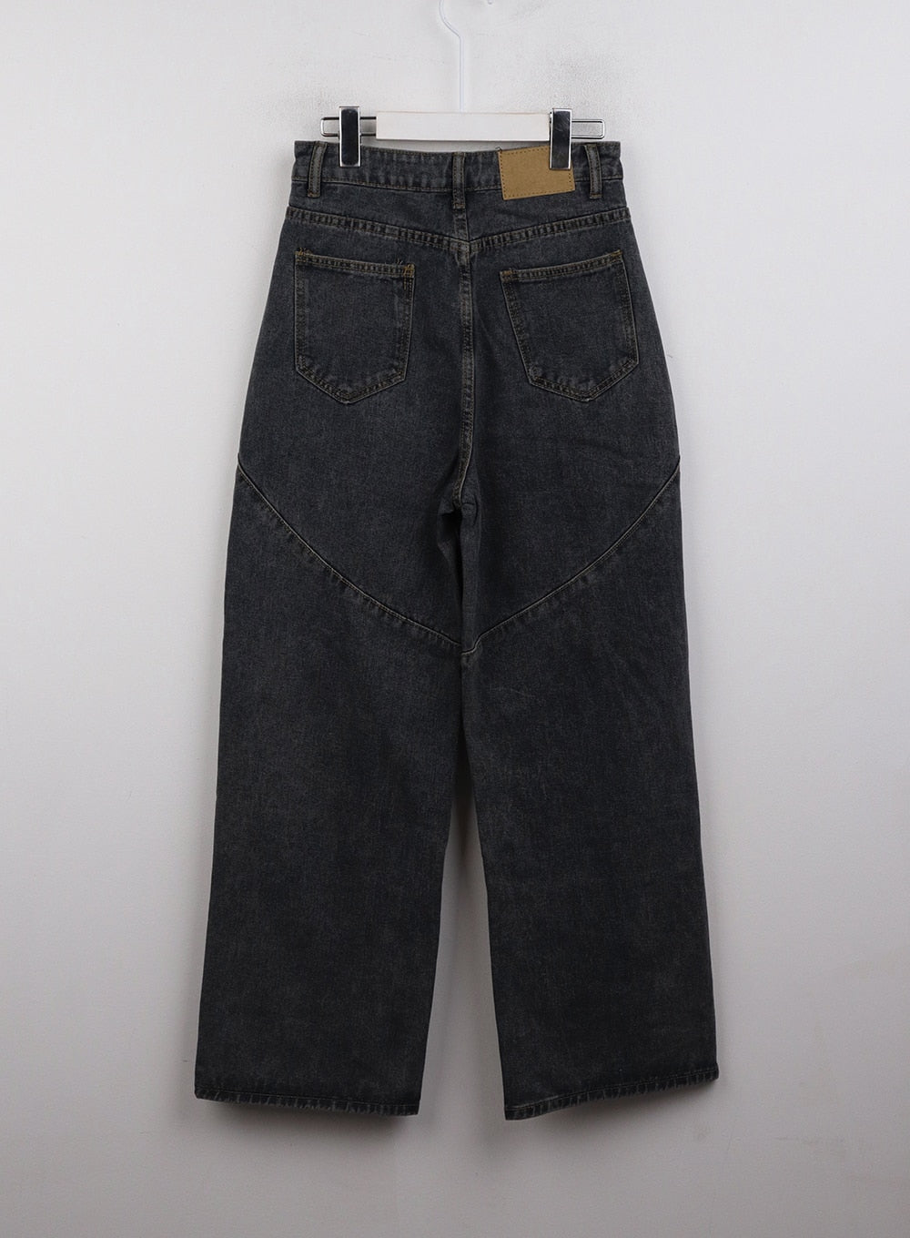 Mid Waist Cargo Jeans CJ411 in dark blue, flat back product shot on hanger, wide-leg washed denim showing twin back pockets, leather patch, and curved panel seam construction.