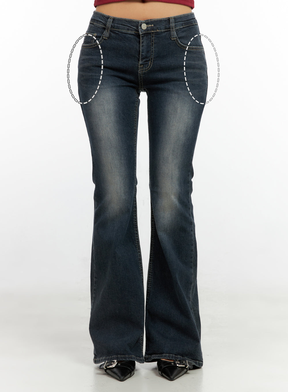 Ingrid Low-Rise Washed Flared Hip Pad Denim Jeans CN404 in dark blue, front detail shot highlighting hip pad zones marked with dashed circles, low-rise waistband, slim-fit flared leg.