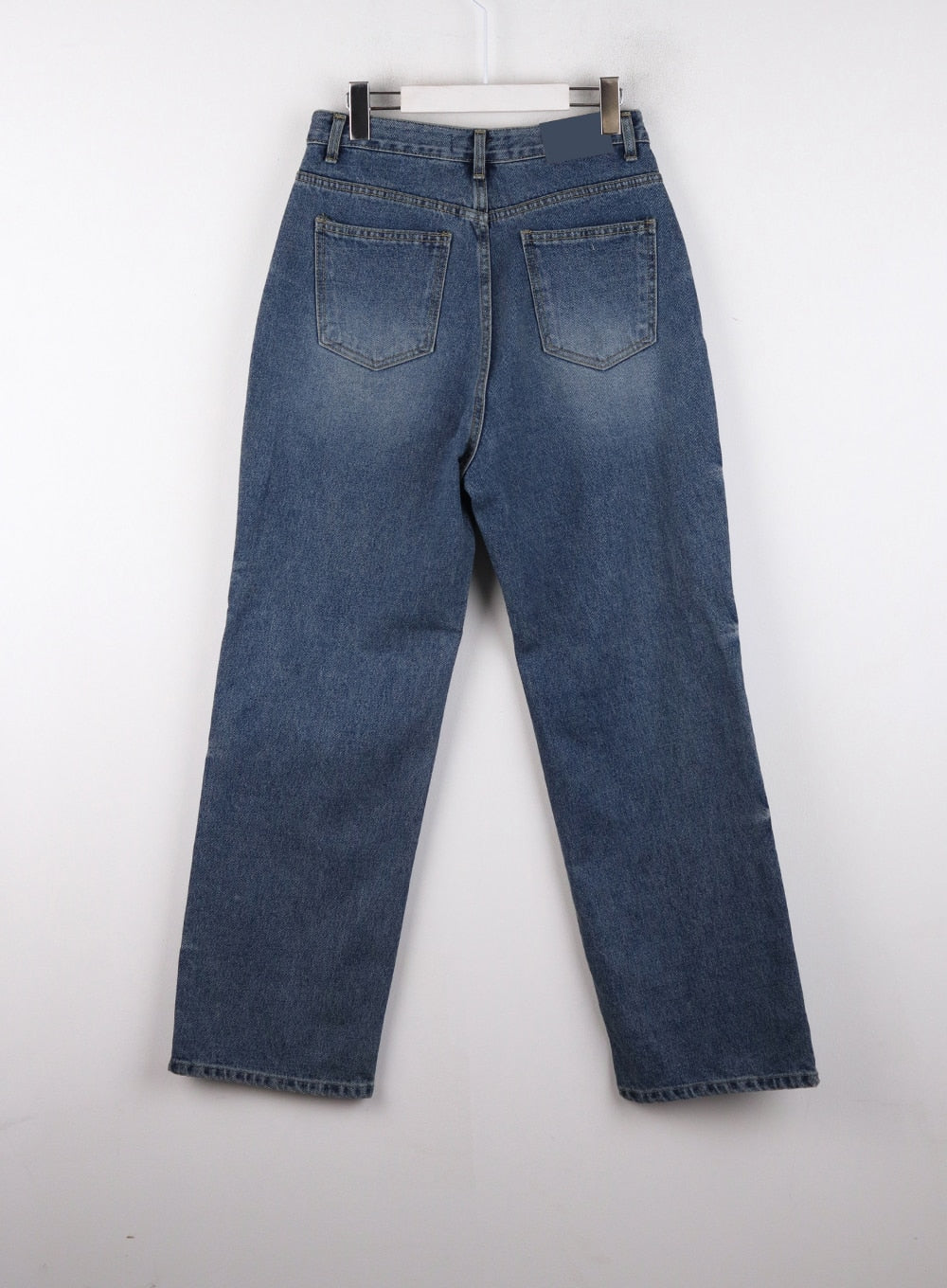 Washed Denim Wide Leg Jeans CD308 in blue, flat hanger back shot, dual back pockets with stitching detail, washed cotton denim showing vintage-style fading across seat and thighs.