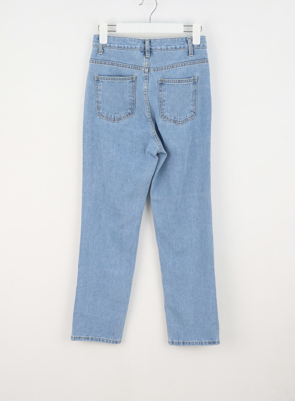High Waist Jeans OY330 in light blue, flat back hanger shot, showing dual patch back pockets, waistband, and straight-leg silhouette in light wash cotton denim.