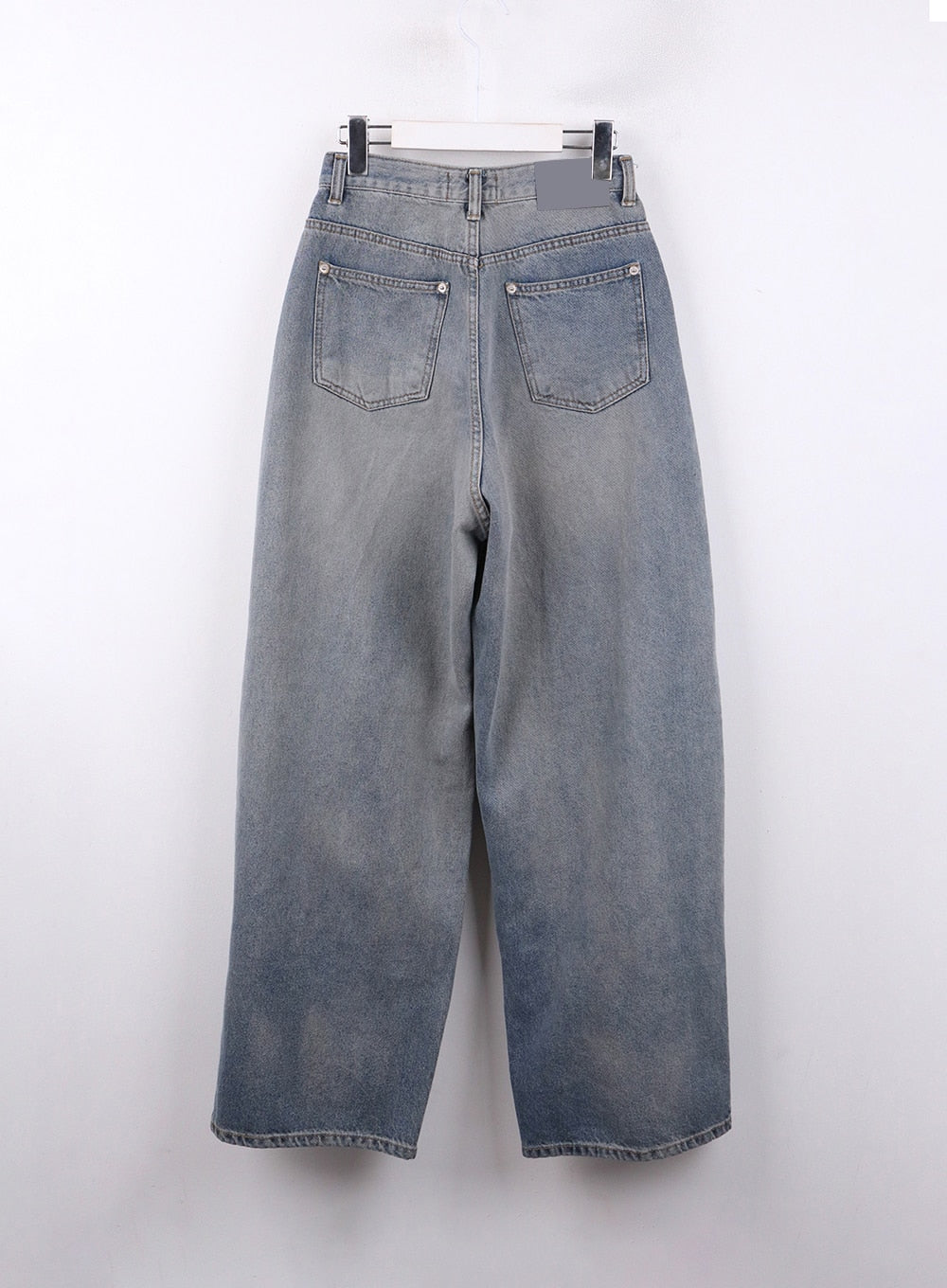 Pintuck Washed Denim Wide-Leg Jeans CJ418 in blue, flat back product shot on hanger, two back patch pockets with silver rivets, wide-leg washed cotton denim with gradient fade detail.