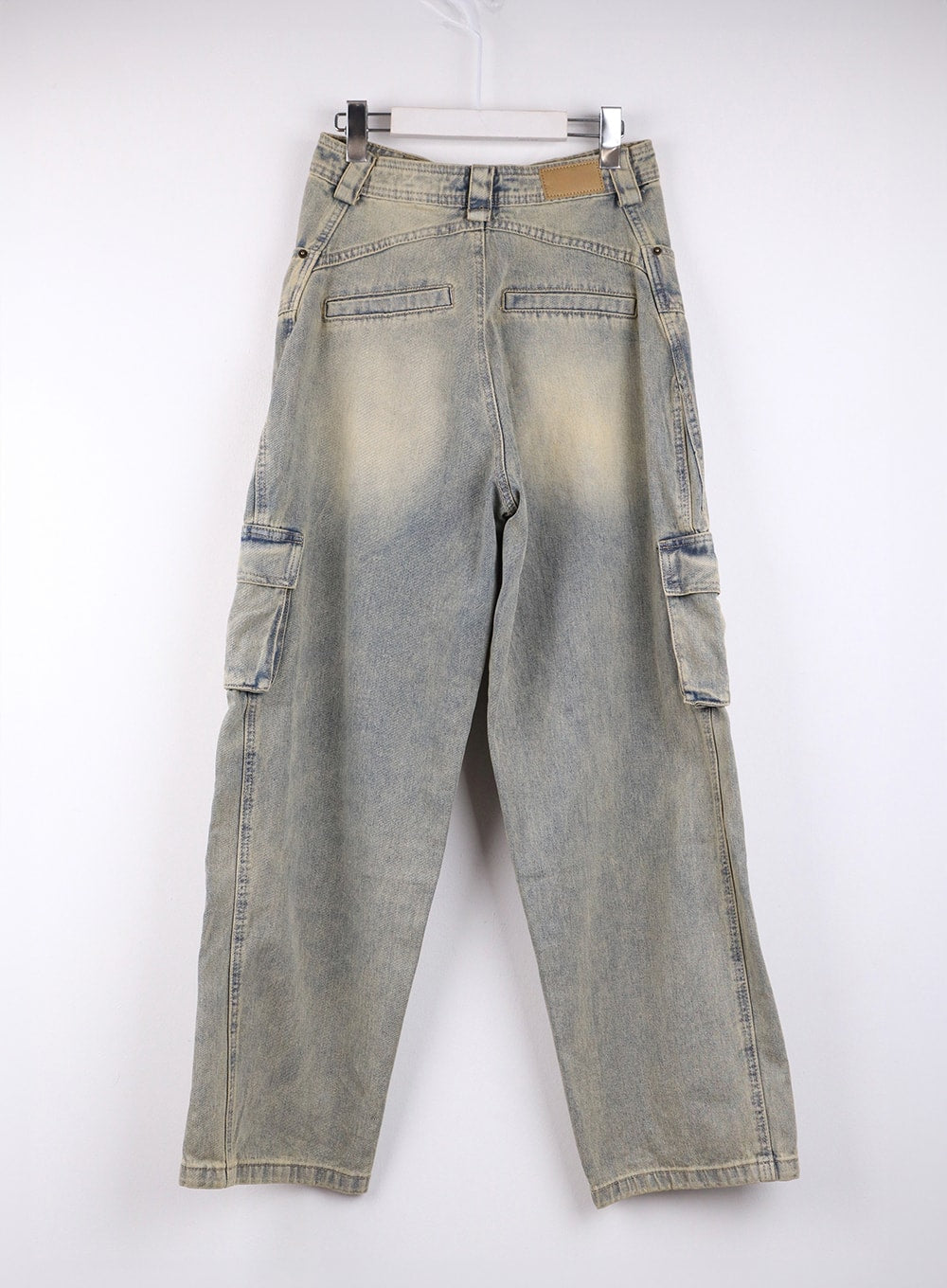 Cargo Denim Straight Leg Jeans CJ422 in blue, flat back product shot on hanger, showing rear patch pockets, brand leather label at waistband, bilateral cargo pockets, and washed denim finish.