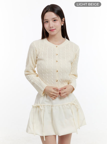 cable-knit-buttoned-cardigan-og429 / Light beige