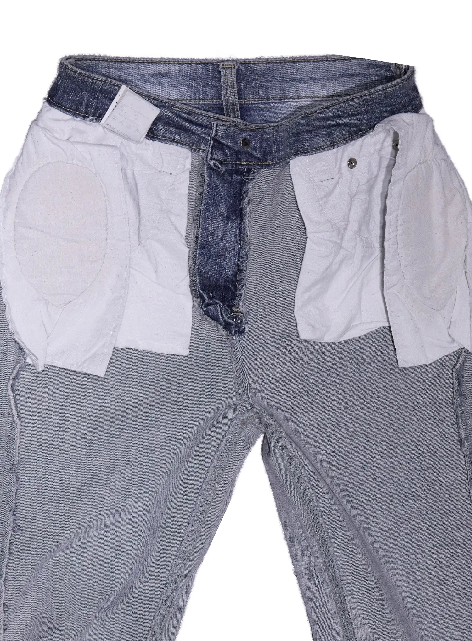 Soyeon Flared Jeans with Hip Pads CU520 in dark gray, inside-out flat detail shot showing built-in oval hip pad panels sewn into the waistband lining for enhanced hip curve shaping.