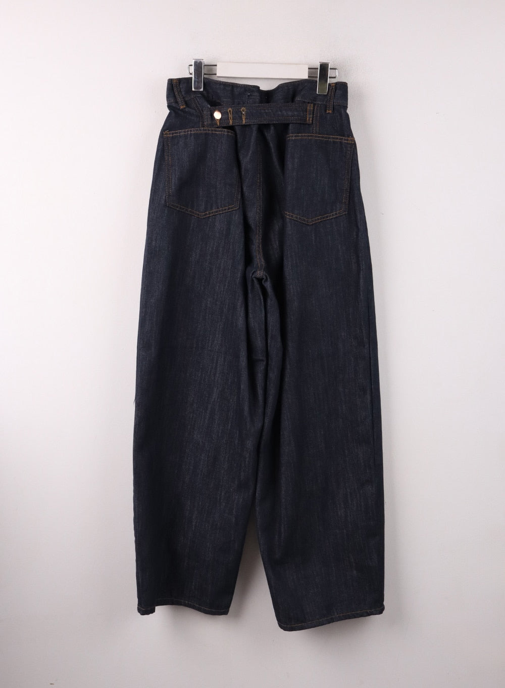 Back Button Wide Leg Jeans CF407 in blue, flat hanger back product shot, dark indigo denim revealing back button closure, two patch pockets, and contrast golden topstitching.