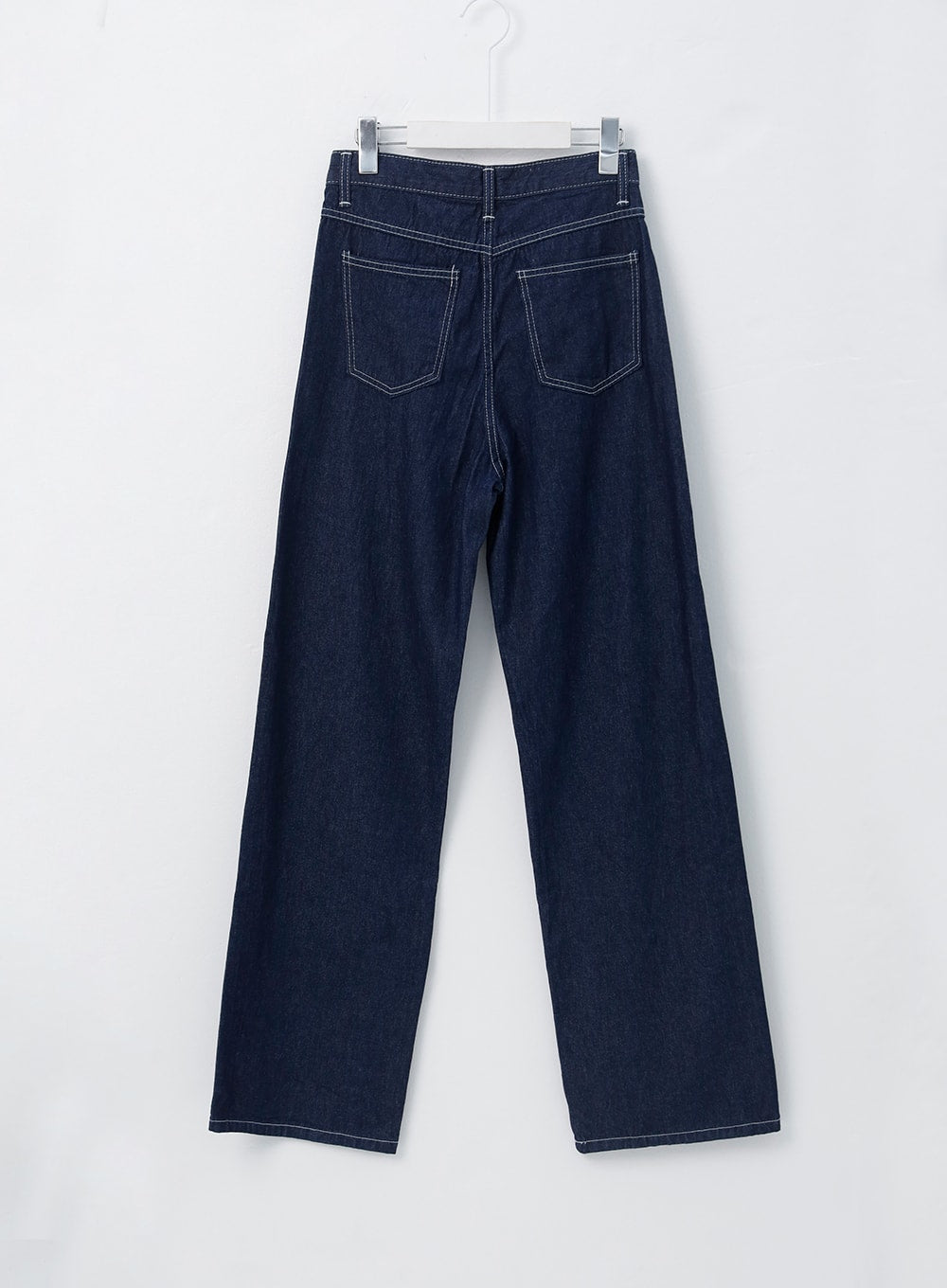 Stitched Jeans OO305 in Blue, flat back hanger shot, dark indigo wide-leg denim, contrast white stitch on large back pockets and waistband seam detail.