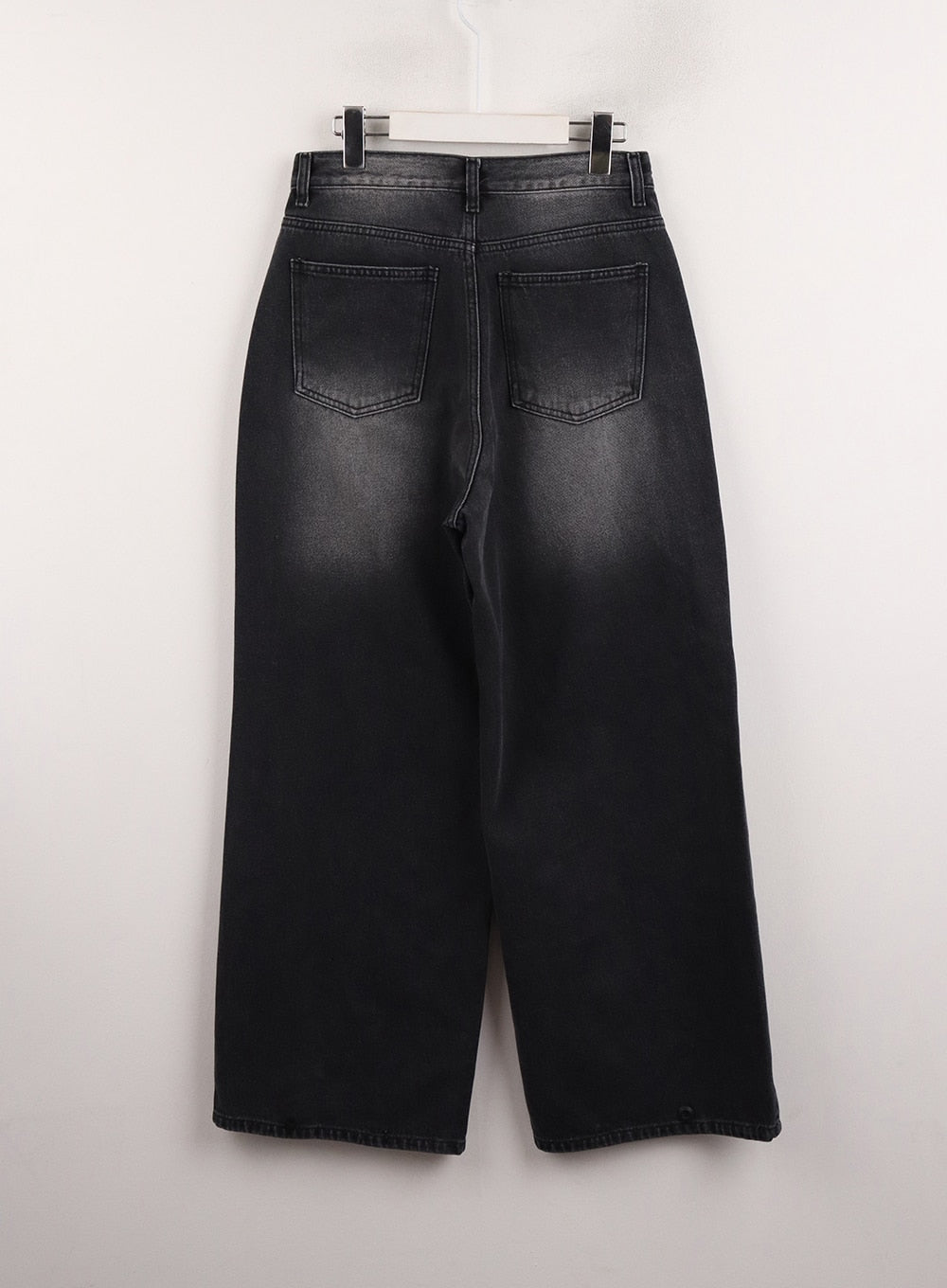 Denim Mid-Waist Pocket Wide Leg Jeans CJ415 in Black, flat hanger back shot, showing dual stitched back pockets, center seam, and washed black denim with subtle fade detail.