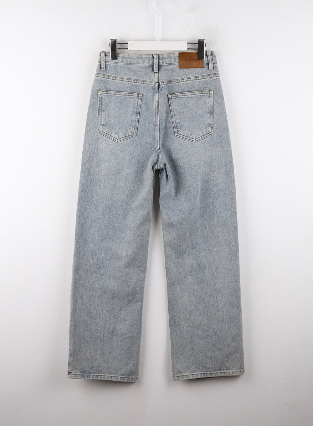 High-Waisted Full-Length Straight Leg Jeans OD320 in light blue, flat back hanger shot, washed denim with dual back patch pockets and branded leather waistband tab.
