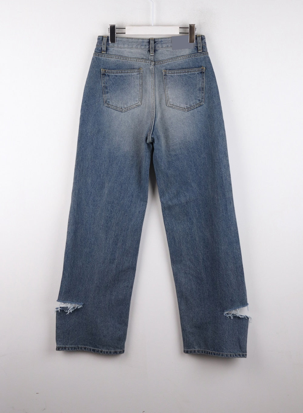 Ripped Straight Leg Jeans CD308 in blue, flat back hanger shot, washed cotton denim showing dual back pockets, clean back seam, and destroyed frayed hem at ankle openings.