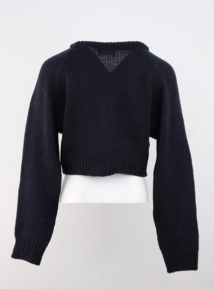 cable-knit-v-neck-sweater-os313