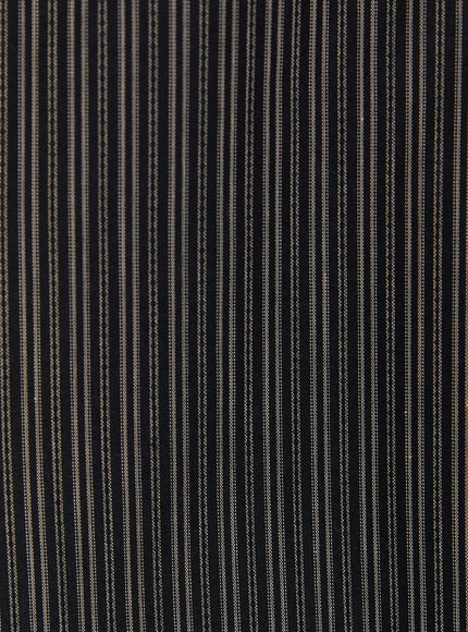 Oversized Short Sleeve Button-Up Shirt CU519 in charcoal, macro fabric close-up showing fine multi-line vertical stripe woven texture with tan and grey thread detail on dark ground.