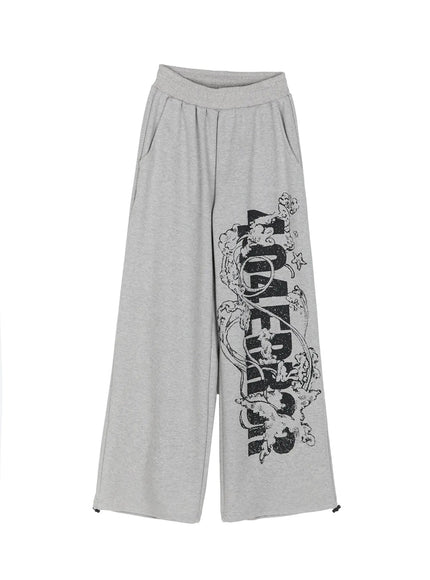 404 Error Graphic Sweatpants IL516 Gray flat-lay front view showing full-length wide-leg silhouette with black distressed graphic print and drawstring hem