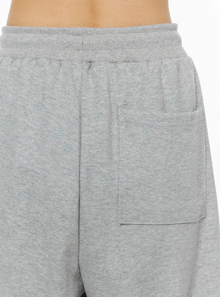 404 Error Graphic Sweatpants IL516 Gray close-up detail shot of waistband showing ribbed elastic waist and patch pocket on hip