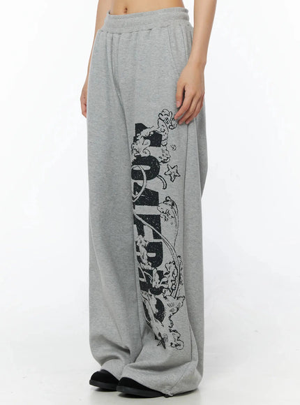 404 Error Graphic Sweatpants IL516 Gray side shot on model cropped at waist showing graphic print placement on outer leg and relaxed drape