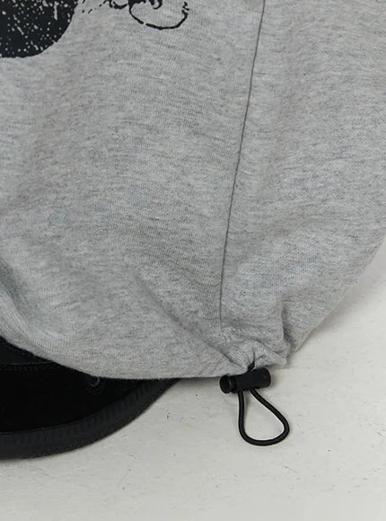 404 Error Graphic Sweatpants IL516 Gray close-up detail shot of hem showing drawstring cord toggle adjuster and side seam construction