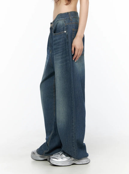 Ace Washed Wide Leg Jeans CL522 Dark blue side view on model, angled shot showing voluminous barrel leg silhouette, whiskering detail, coin pocket and side seam visible