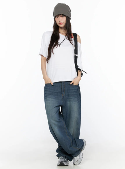 Ace Washed Wide Leg Jeans CL522 Dark blue full-body front styling shot on model wearing grey beanie and white off-shoulder tee, hands in pockets, oversized balloon leg denim