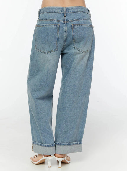Adeya Cuffed Straight Jeans IU524 Blue back waist-to-hip shot on model showing two back patch pockets, belt loops, and faded light blue denim stitching detail