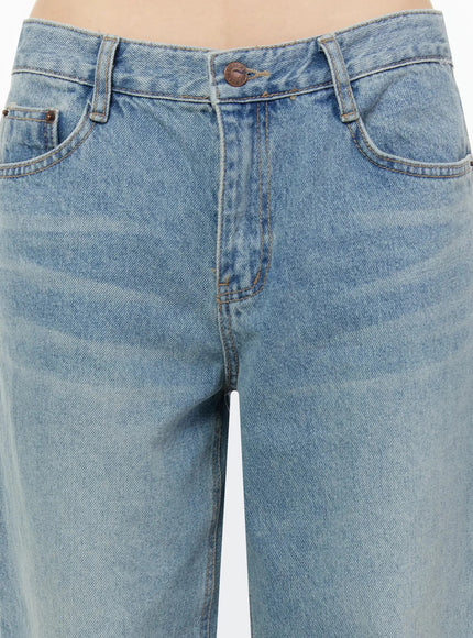 Adeya Cuffed Straight Jeans IU524 Blue close-up detail shot of waistband, button fly, and front pockets showing faded light blue denim texture and stitching