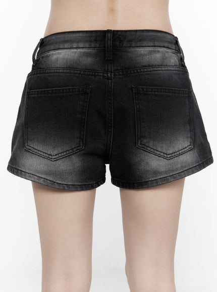 Adrian Denim Shorts IL522 Black back close-up on model showing dual back pockets with V-stitch detail and faded washed denim texture