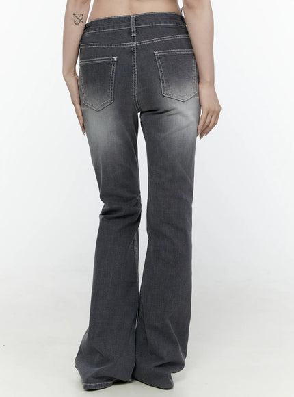 Alira Dark Wash Bootcut Jeans IL522 Gray back shot on model cropped waist to hem showing two rear patch pockets white contrast stitching bootcut flare and faded grey wash