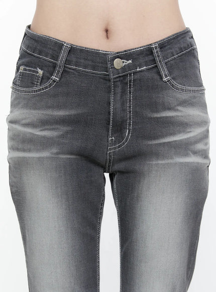 Alira Dark Wash Bootcut Jeans IL522 Gray close-up detail of front waistband showing low-rise V-cut crossover waist silver button white contrast topstitching and front pockets