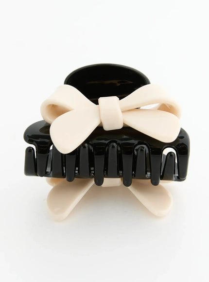 Amber Mix Hair Clip IL503 Black and Ivory front close-up view showing matte cream bow knot detail and glossy black claw teeth structure