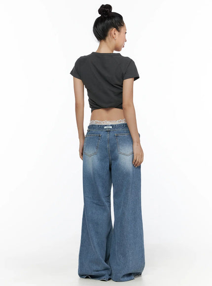 Anyae Mid-Wash Knee Distressed Wide Jeans CL510 blue full-length back shot on model with bun updo showing lace waistband detail back pockets and floor-length wide leg