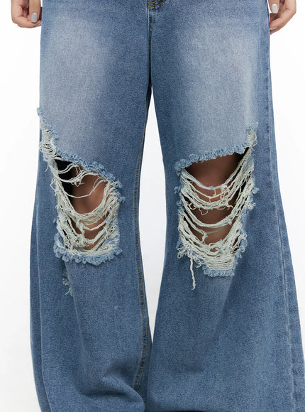Anyae Mid-Wash Knee Distressed Wide Jeans CL510 blue close-up detail shot of both knees showing heavy frayed distressing and threadbare rips