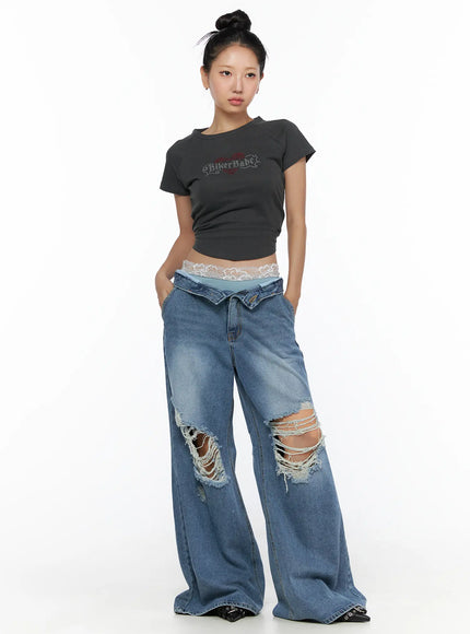 LEWKIN Anyae Mid-Wash Knee Distressed Wide Jeans CL510 blue full-length front shot on model with bun updo styled with lace waistband and crop tee