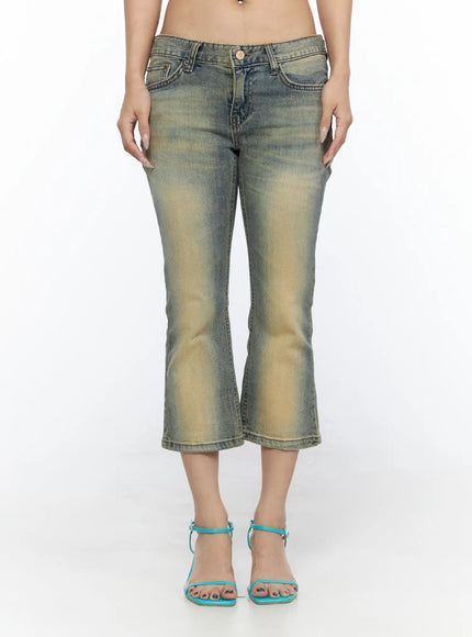 Archie Deep Tint Wash Capri Jeans CL528 Blue front full-length view on model arms relaxed at sides showing complete low-rise cropped flare silhouette with teal ankle-strap heels
