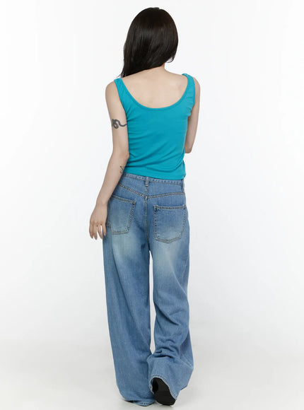 Arden Distressed High-Waist Baggy Jeans IL522 Blue back full-length on model in teal tank top showing rear patch pockets faded wash and wide-leg hem