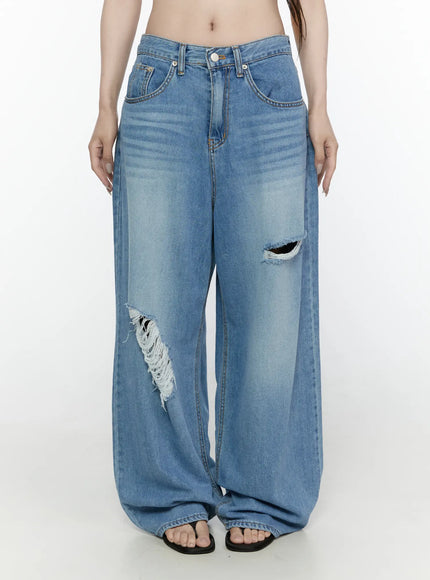 LEWKIN Arden Distressed High-Waist Baggy Jeans IL522 Blue front view on model size S showing double ripped knee detail and wide-leg silhouette with faded wash