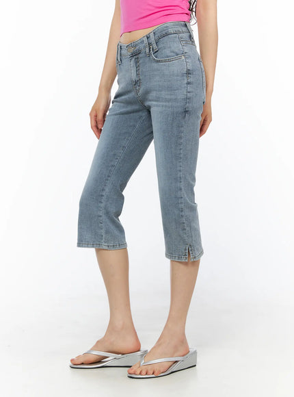 Aris High-Waist Capri Jeans CU530 Light blue side view on model with pink halter top, butterfly chain belt accessory and silver sandals