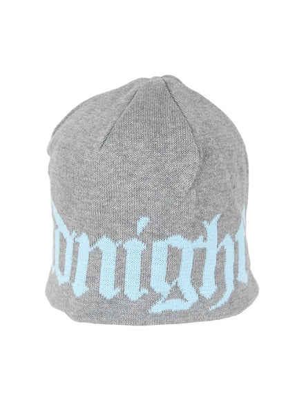 Aspen 1988 beanie IL503 Grey product flat shot angled view showing light blue gothic script jacquard lettering on grey knit beanie