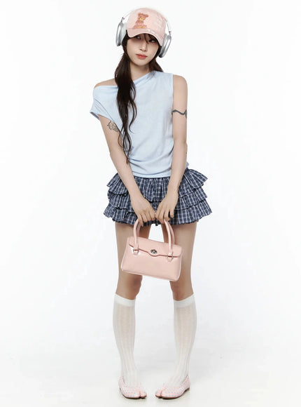 LEWKIN Asymmetric Off-Shoulder Top IL506 Light blue front full-body model shot styled with plaid ruffle mini skirt pink bag and white knee socks S/M