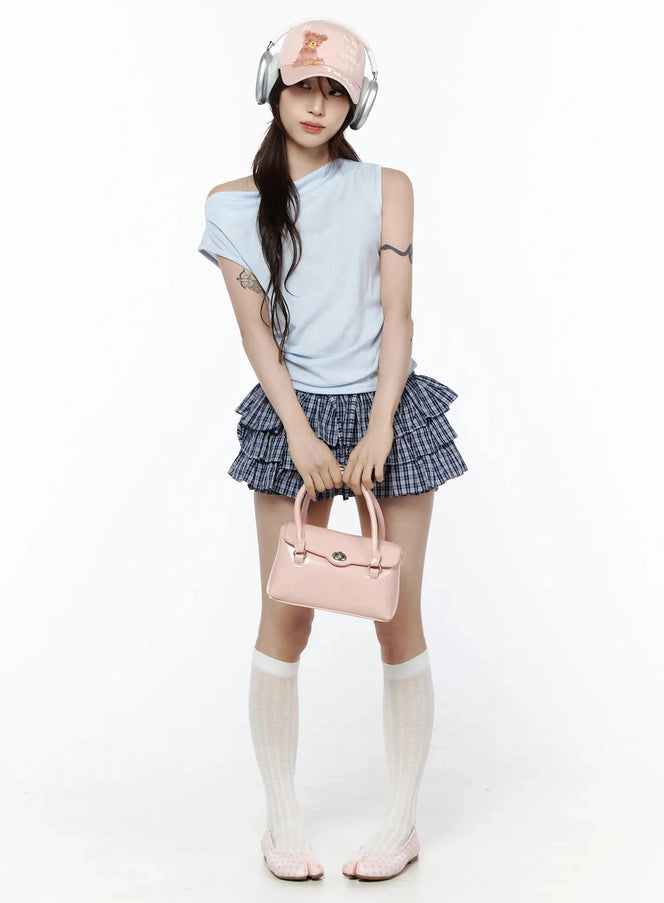 LEWKIN Asymmetric Off-Shoulder Top IL506 Light blue front full-body model shot styled with plaid ruffle mini skirt pink bag and white knee socks S/M